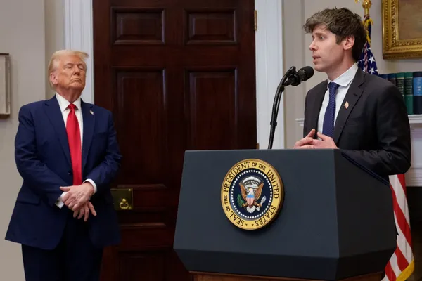 Sam Altman speaking at a White House podium with Donald Trump standing nearby